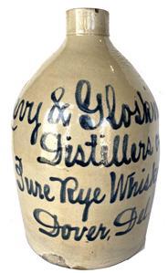 G145 Stoneware Jug with Dover, Delaware Stoneware Advertising Jug, attributed to the Fulper Pottery, Flemington, NJ, late 19th century, jug featuring the slip-trailed cobalt advertising "Levy & Glosking, / Distillers of / Pure Rye Whiskey / Dover. Del.