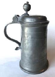 RM1071 Wonderful Pewter Tankard marked �J. N. 1875� on the lid. There is also an embossed pattern creating a ring that encircles the scrolled initials and date on the lid. Inside on the bottom of the Tankard, there are two engraved rings encompassing a fairly prominent touch mark.