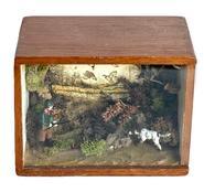 L451 Folk Art Hunting Diorama with Lead Figures constructed inside a vintage Armando Ramos Cigar box. Handmade with great use of natural elements to depict a realistic bird hunting scene. Measurements: 6 ¼ wide x 3 7/8 deep x 4 ¾ tall.