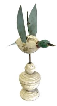 **SOLD** M280 Original painted Folk Art Duck Weathervane. Wooden body with tack eyes and tin tail and wings. Mounted in an original white painted architectural wooden base for display purposes.  Measurements: ~14 &frac34;� long x 4 &frac14;� wide (tail). Overall mounted height is ~20� tall.  