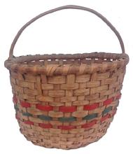 *SOLD* Z480 Early 20th century Gathering Basket from Delmar Delaware, with a single wrap rim and a kicked in bottom, steamed and bent handle with two red band and one green.