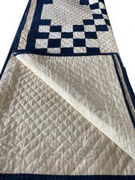 Stunning Double Irish Chain pattern quilt, all hand quilted with cross hatch quilting and hand sewn binding. The use of indigo blue and white for this geometrical pattern, along with the simplistic pattern of the hand quilting, is indicative of the 1860-1880 time period 