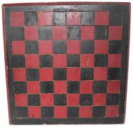 B340 Late 19th century Game Board , with the original red and black paint, one board white pine construction, with a champfered edge, each block on the Game Board is deep scribed, to make each block stand out. carved on  the back are the initials (C.C. H.) Measurements are: 14" x14"