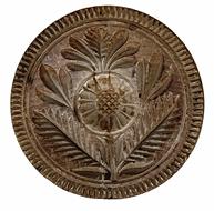 *SOLD* X268 Maple Chip-carved butter print of Pennsylvania origin from the 19th century. Of sunflower form, this is very fine chip carved print with deep cross hatching and flamboyant leaves. A great example of folk art. Measurements: 4 ½� diameter x 3 ½� tall  