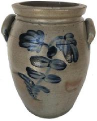 E243 STAMPED "P. HERRMANN.", BALTIMORE, MARYLAND DECORATED STONEWARE JAR, salt-glazed, "3" gallon capacity mark, semi-ovoid form with squared rim, beaded neck ring, incised shoulder ring, and arched handles. Brushed cobalt floral decoration to each side, additional cobalt at handle terminals. The pottery of Peter Herrmann (1825-1901), Baltimore, MD. Circa 1875. 13 1/8" H, 7 3/4" D rim.