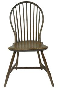    Y147 Early  19th Century nine spindle back Windsor Bow Back Side Chair,with original nutmeg paint, The mixed wood bow back Windsor side chair has a solid shaped pine seat and an ash bow back with bamboo form turned legs, it  has a nine spindled back.