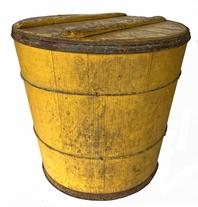 *SOLD* H901 Late 19th century oversized lidded wooden bucket in original vibrant yellow paint. Wooden staved sides secured with metal wire bands.  Metal bands around the bottom and the lid. Original wooden battens applied across the lid have kept it from warping over the years. A series of tiny drilled air holes remain in the center of the lid. Natural patina interior. Measurements: 13� diameter bottom x 15 ¾� diameter lid x 15� tall with lid 