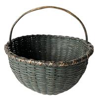 K1623 19th century tightly woven splint gathering basket bears its original dark Windsor green painted surface, a hand carved, steamed and bent handle that is woven into the sides and a double wrapped rim. Woven bump up inside bottom allows for airflow of gathered items. Good condition with minor loss at bottom edge that does not affect integrity of the basket. Measurements: 12" diameter x 11 tall at handle. Sides are 5 ¾ tall.  