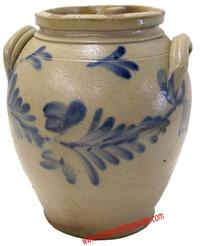 Philadelphia cobalt decorated stoneware jar, attributed to a Philadelphia Maker, tall collared jar with rib handles and foot decorated front and back with two brushed cobalt flowers.