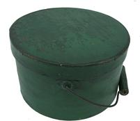 T191 Bail Handle Pantry Box with old green paint showing some wear, bent oak sides with nailed lap joint, wire bail handle with turned wood handle. 9 1/2" diameter x 5 1/2' 