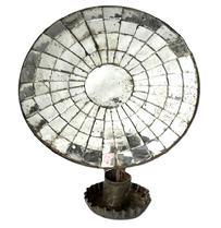 L234 19th century hanging tin wall sconce with round mirrored back and fluted edge drip cup. Nicely rolled edges with secure solder joints. Measurements: Mirrored area measures 7 ¾ x 8. Overall height is 8 5/8 tall and the outer front edge of the drip cup extends 4 ¾ from the wall when hanging.