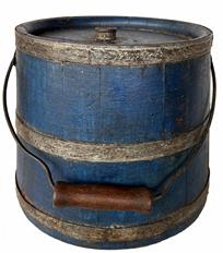 RM1364 Gorgeous original blue painted wooden Shaker bucket with hole for spout. Stave constructed with three metal bands. Retains working metal Bale handle with tin diamond escutcheons still intact. Second-half 19th century. Measurements: 8 1/2" diameter (top) x 10" diameter (bottom) x  8 1/4" tall