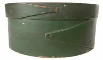 G835 Fantastic New England original green painted pantry box. Steamed and bentwood pine, poplar/basswood, and maple, oval form secured with tacked opposing finger-lap and wooden-pin construction. Probably Massachusetts. Mid 19th century.  Measurements: 6 1/4" x 4 3/4" oval x 2 3/4" tall