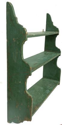 G265 Late 19th century New England original green hanging wall shelf circa: 1870-1900, with three graduated shelves on shaped ends, the shelves are mortised into the sides with original green paint, and decorated with red pin striping on each side