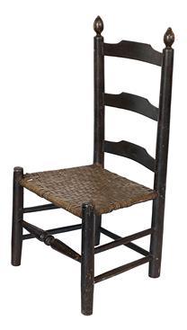 G86 Mid 19th Child's ladder back chair, with three slates in early black paint, with it original hickory woven seat,