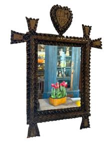 M81 Early 20th century American Tramp Art Mirror with a Heart bearing the initials J. M. and dated 1909. Hand chip-carved and bears the original gold gild painted surface. Tiny square head nail construction. Overall measurements: 11 wide x ~1 deep x 15 tall.