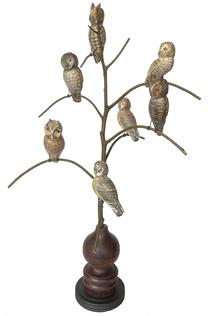 *SOLD* J22  American, 20th Century Folk Art Owl Tree, with seven different beautiful hand carved and polychrome painted wooden Owls in various poses resting on steamed and bent branches. Mounted in a multi-tiered acorn shaped base for display.  Signed, and branded on bottom, "Ken Kirby". Approximate measurements: ~17" across widest point x ~ 29" at tallest point. Bottom of base is 5 3/8" diameter. Owls range in sizes based on pose but are each approximately ~5 1/2" x ~2" x ~6"long.