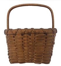 G520 Early 20th century Miniature Basket made of splints of ash. It has aged delightfully, darkening to a rich, deep chestnut color. Notches carved into the handle sides attach it to the rim. This fabulous little basket is full of painstaking details. 