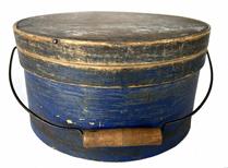 RM1402 19th century New England original indigo blue painted bail handled pantry box with double banded lid. Steamed and bentwood sides and bands secured with tiny tacks. Clean, natural patina interior. Measurements: 11" diameter x 6 1/4" high.  