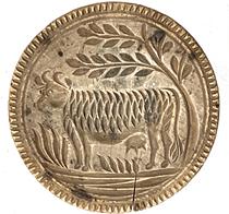 K55 19th century chip-carved butter print stamp of Pennsylvania origin boasting a deeply carved Cow design. There is a small age crack from wood shrinkage.  Very dry, natural patina surface. Measurements:  3 tall x 4 5/8 diameter 