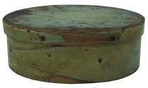 X16 New England Oval pantry box, with early mustard paint over the original blue, 4 1/2? wide X 6'' long 2 1/8? tall.