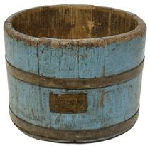 **SOLD** M250 Late 19th century Pennsylvania Dry measure in early dry blue painted surface. Thick walled staved and bentwood construction secured with two metal bands. Branded �4 QTS.� Along the top edge and bears an original brass label that reads: �FROM MICHELL�S SEED HOUSE  518 MARKET ST  PHILA.� Great wear and patina from age and years of use. These were used in general stores to measure out dry goods such as grains, sugar, etc. (Research indicates Michell�s Seed Company was started in 1890 and moved into the location at 518 Market Street in 1900.) Measurements: 9� top diameter x 8 &frac12;� bottom diameter x 6 &frac34;� tall sides. 