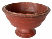 RM1370 Rare, New England painted wooden compote in old red paint over the original bittersweet paint. Early lathe-turned. Tall, raised lip around the top edge and wonderful incised lines gracefully encircling top and bottom add a decorative look to this functional piece. Circa 1850. Measurements: 10 ½ diameter x 6 tall