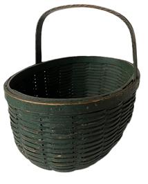 **SOLD** K1859 19th century New England gathering Basket with the original green paint.  Sturdy, oval shaped heavy basket is constructed with a solid wooden double bottom and applied double rim to the top of the basket with a high, solid wooden handle woven into both sides. The rims, handle and double bottoms are all secured with small tacks. This Basket is very well made. Measurements: 16 ½ long x 11 ½ wide x ~13 ½ tall with handle. The sides are 7 ½ tall.  