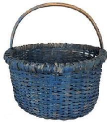 E601 Late 19th century Gathering Basket with beautiful dry blue paint, single wrapped rim with a reinforced bottom, notched steamed and bent handle .