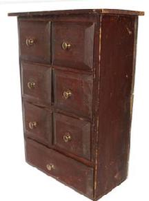C513 19th century Seven Drawer Spice Cabinet, circa 1880 six small drawers over one large drawer in simple nail construction with old red surface