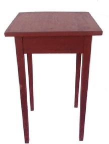 Z408 Early 19th century mortised and pegged Hepplewhite Table with tapered legs from Pennsylvania in original dry red paint. The wood is pine. One board top held in place with wooden pegs.  Measurements: 27 3/4" h x 17 3/4" w x 17 1/2" d