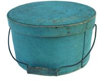 U354  Wellington New Hampshire,Bail Handle Pantry Box,  is in the original dry blue paint.Signed on lid , It is a large box, great condition, measuring 6 1/2" tall x 11 3/4" diameter