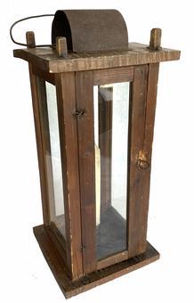 G902 19th century Lantern pinned construction. Four windows are contained within a wooden box frame that is pine and tiger maple retaining wonderful original surface. To access the candle, you have a hinged door, the candle holder is tin and is attached to the bottom of the case.