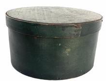 G524 19th century pantry box in original green paint. Steamed and bent wood is held in place with tiny wooden pegs around top and bottom and tacks secure the overlaps. Wonderful natural patina inside. Measurements: 5� tall x 9 3/4� diameter (top) x 9 1/2� diameter (bottom) 