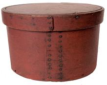 G818 Very thick walled wooden pantry box  in original red paint with steamed and bent sides secured with square head nails and tiny wooden pegs. Great natural patina inside.  Measurements: 12� diameter x 7� tall
