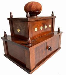 G214 Shaker Sewing Box, circa 1830�s On top of Box is a fixed Round carved Wooden holder with a Pin Cushion The Lid for top box has 4 wooden pins which hold wooden cover in place