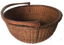 E482 Nantucket Swing Handle Lightship Basket Circa 1890Carved and notched wooden ears, turned, molded and incised bottom; tapered and chamfered oak ribs, good color