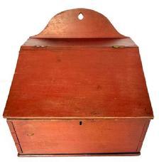 M52 Large 19th century Lancaster County, Pennsylvania Wall Box with hinged lid and arched tombstone back in original red painted surface. The wood appears to be poplar with dovetailed case with square head nail construction and hole in top for hanging purposes. Circa 1820s-1830s. Measurements: 13 &frac14;� wide x 11 &frac14;� deep x 5 &frac34;� tall (front) x 11 &frac12;� tall (back)