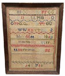 G572 Late 18th century early 19th century Sampler identified as being wrought by �Amy King�, undated. This simplistic work includes two sets of double alphabets