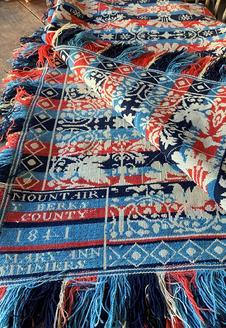 G719 Spectacular, early 19th century Pennsylvania Linsey-Woolsey Coverlet identified and dated in all four corners: �Mountairy Berks County 1841 Mary Ann Simmers�. Comprised of red and two shades of blue wool woven over linen to create exquisite patterns that are reversible.