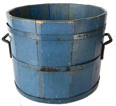 H55 NEW ENGLAND WOODEN BUCKETS.  American, -19th century. Stave construction with two applied handles. Bentwood bands, original blue paint, two iron bands which are fixed at the top and the bottom of the bucket. Two iron ear handles are affixed to the sides of the bucket for ease of transport. It is sturdy and tight with beautiful blue paint. 