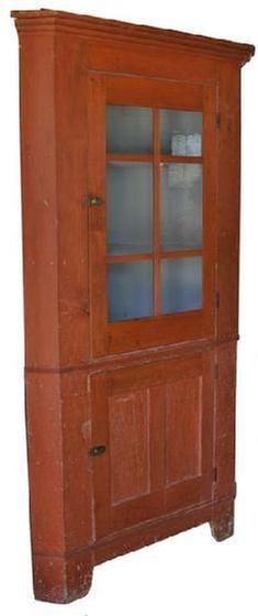 C211 19th century Pennsylvania six pane Corner Cupboard, with the original red paint, with old blue gray interior. High cut out base, with a waist molding. the wood is all white pine, circa 1840   83" high 39" wide
