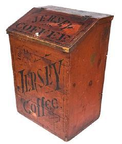 L271 Late 19th century General Store Coffee Bin for �Jersey Coffee� with its original pumpkin painted surface advertising �100 pounds Jersey Coffee� stenciled in black on the front, and �Pittsburg Pa � stenciled on the back. Hinged slant front lid on top bears �Jersey Coffee� and �Dayton Spice Mills Dayton O.� in black with black pin striping. Applied molding surrounds the lid. Clean, natural patina interior. Circa 1885 � 1890�s. (NOTE: �Jersey Coffee� was a specialty brand of the Dayton Spice Mills Company, established in 1885.) The wood is pine. Measurements: 22 &frac14;� wide x 17� deep x 31 &frac34;� tall (back) x 27 &frac14;� tall (front).