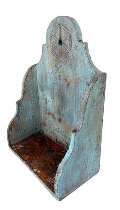 **SOLD** K1775 Exceptional 19th century New England painted candle shelf in the original dry blue paint with shaped sides and back boasting a chip carved design. The wood is white pine. Small square head nail construction. Measurements 10 ½ wide x 5 ½ deep x 15 tall.  