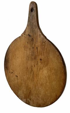 H460 Early 19th century wooden Peel Board. Pine wood, one-board construction. Elongated handle with hole for hanging. Great natural patina and nice wear indicative of use. Measurements: 29" long x 20 3/4" wide x 3/4" thick