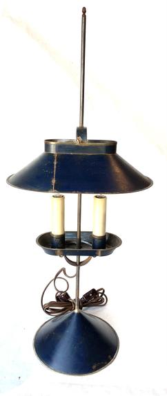 G898  Jerry Martin tin adjustable student lamp with old blue paint, with two electrified candles and signed �JM� on base. (Jerry Martin of Marietta, PA was a Blacksmith and Tinsmith.) Dated 2019. Electrified adjustable double socket with sand filled conical base. 24"h. Condition: Good with minor wear
