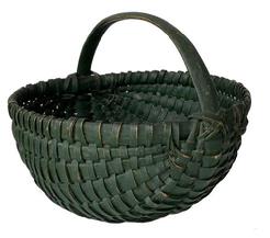 F318 19th century , Melon gathering basket, in original dry green painted surface, woven oak splits on bentwood frame, the handle is hand carved and steamed and bent, heavy construction attributed Shenandoah Valley, Virginia