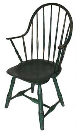 D37 Lancaster County Pennsylvania Continuous Arm chair retaining it�s old green paint. Bamboo style turned legs with a nice saddle seat typical to the late eighteenth century.
