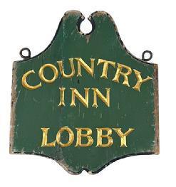 L354 Shaped solid wooden trade sign advertising “Country Inn” “Lobby” in deeply carved letters bearing gold gild paint. The background bears its original green painted surface with original black paint surrounding the entire edge of the sign. Original early iron oversized eye hooks remain intact for hanging purposes. Single sided. Wear indicative of exposure to weather. Measurements: 16” wide x 18” tall x ~1 ¼” thick.