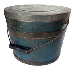 L397 Spectacular identified original blue painted lidded wooden bucket � Stamped on bottom � ��.Made & Warranted, by JAMES WITCHER�.� with arched wire bail handle and turned wooden grip. The thick, solid wood lid is rimmed by a &frac34;� tall metal band secured with hand forged tacks. The interior is old natural patina. Tongue and grooved staved construction held in place with &frac34;� tall metal bands secured with hand forged tacks.  Measurements: 11 &frac34;� � 12� top diameter x 10 &frac14;� bottom diameter x 9 &frac14;� tall.  s.